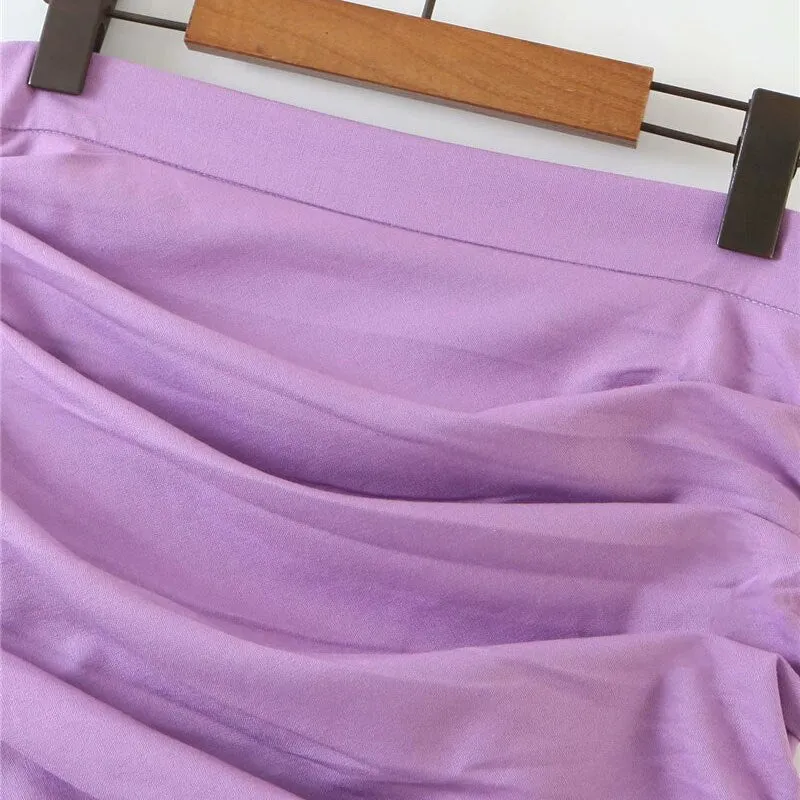 DRAPED ASYMMETRICAL MINI SKIRT