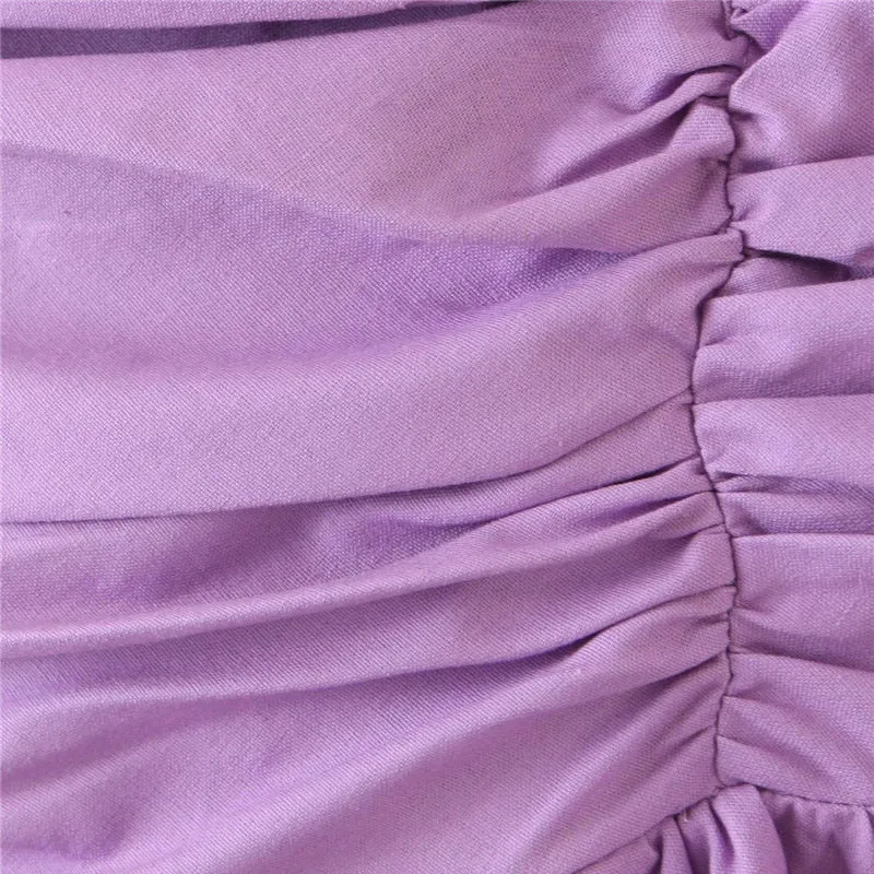 DRAPED ASYMMETRICAL MINI SKIRT