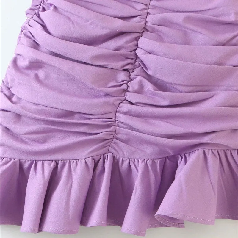 DRAPED ASYMMETRICAL MINI SKIRT