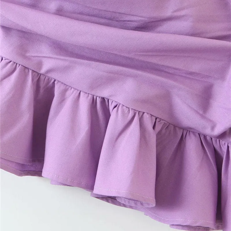DRAPED ASYMMETRICAL MINI SKIRT